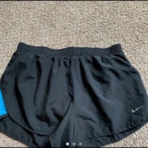 black nike shorts with blue on sides!